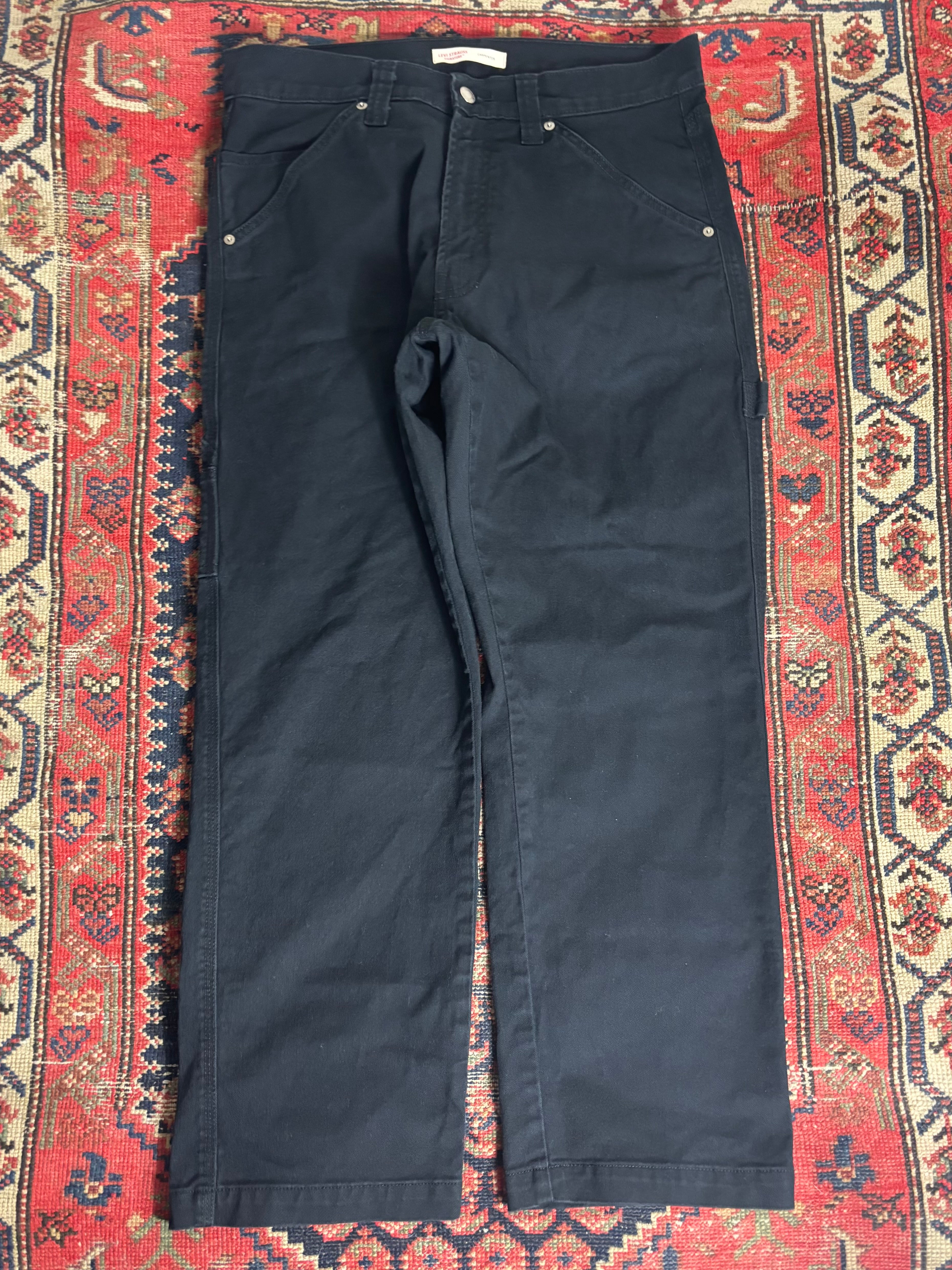 VINTAGE BLACK LEVIS CARPENTER TROUSERS W/ 34