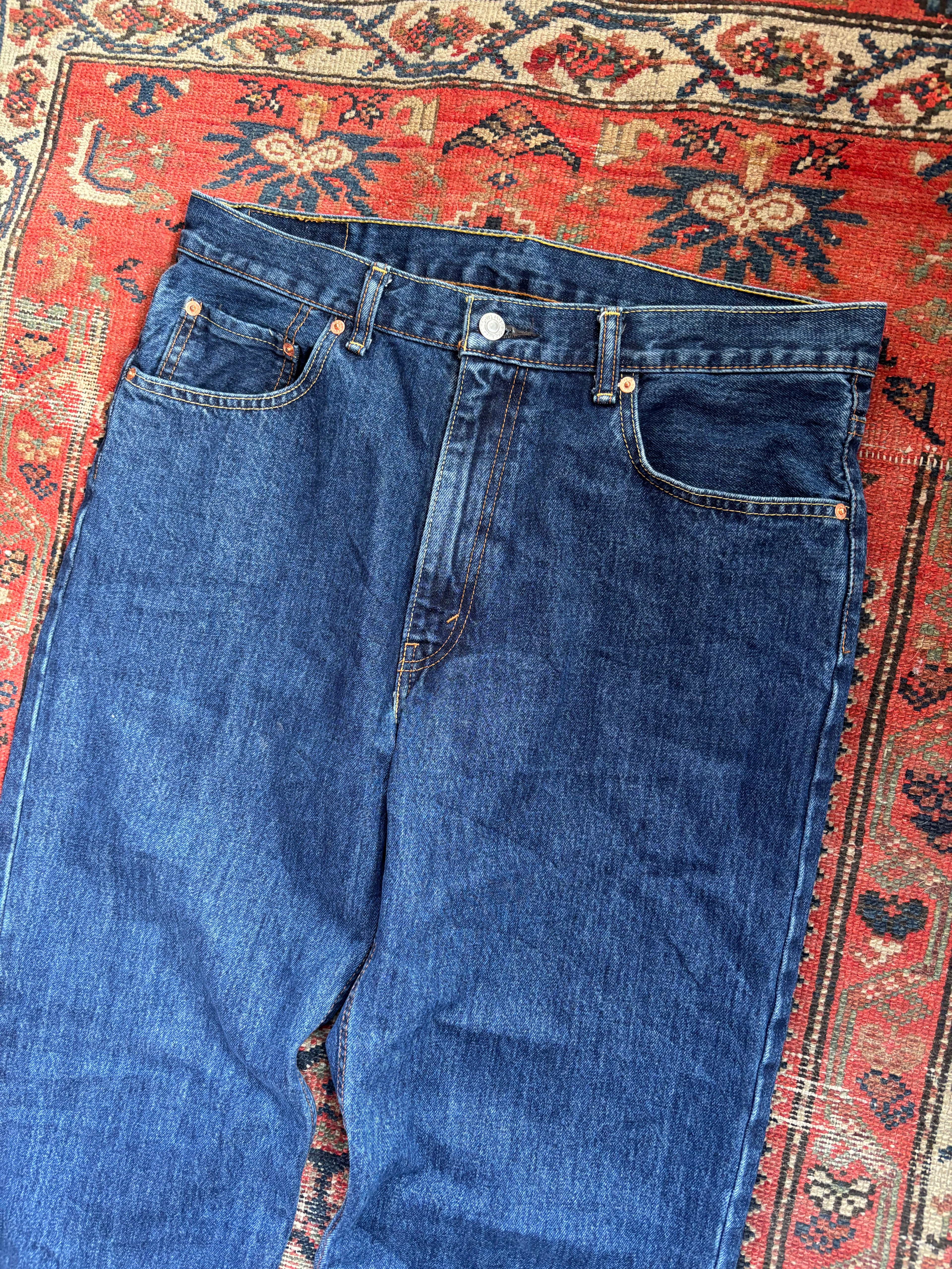 VINTAGE DARK WASH LEVIS 550’S W/36