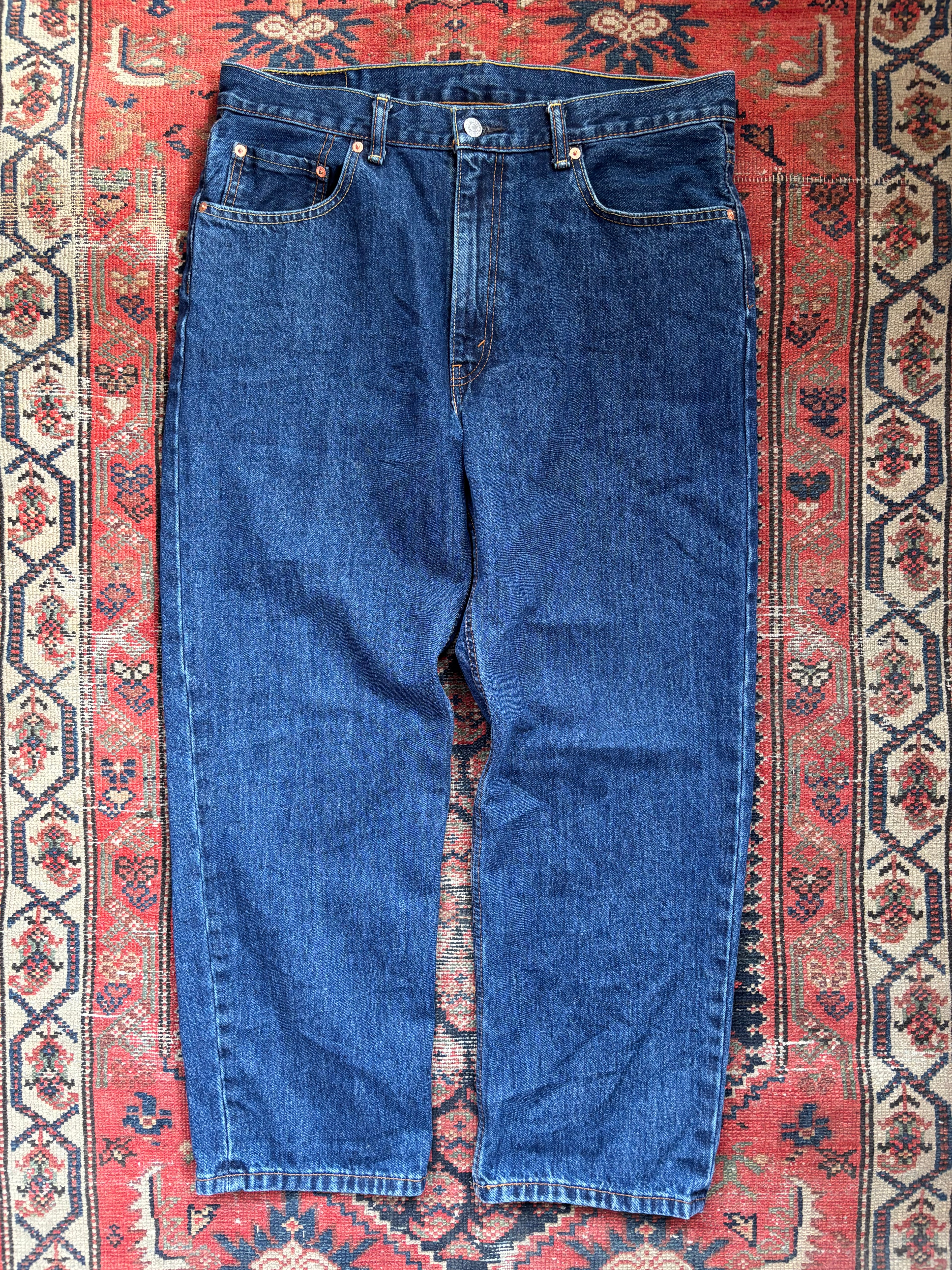 VINTAGE DARK WASH LEVIS 550’S W/36