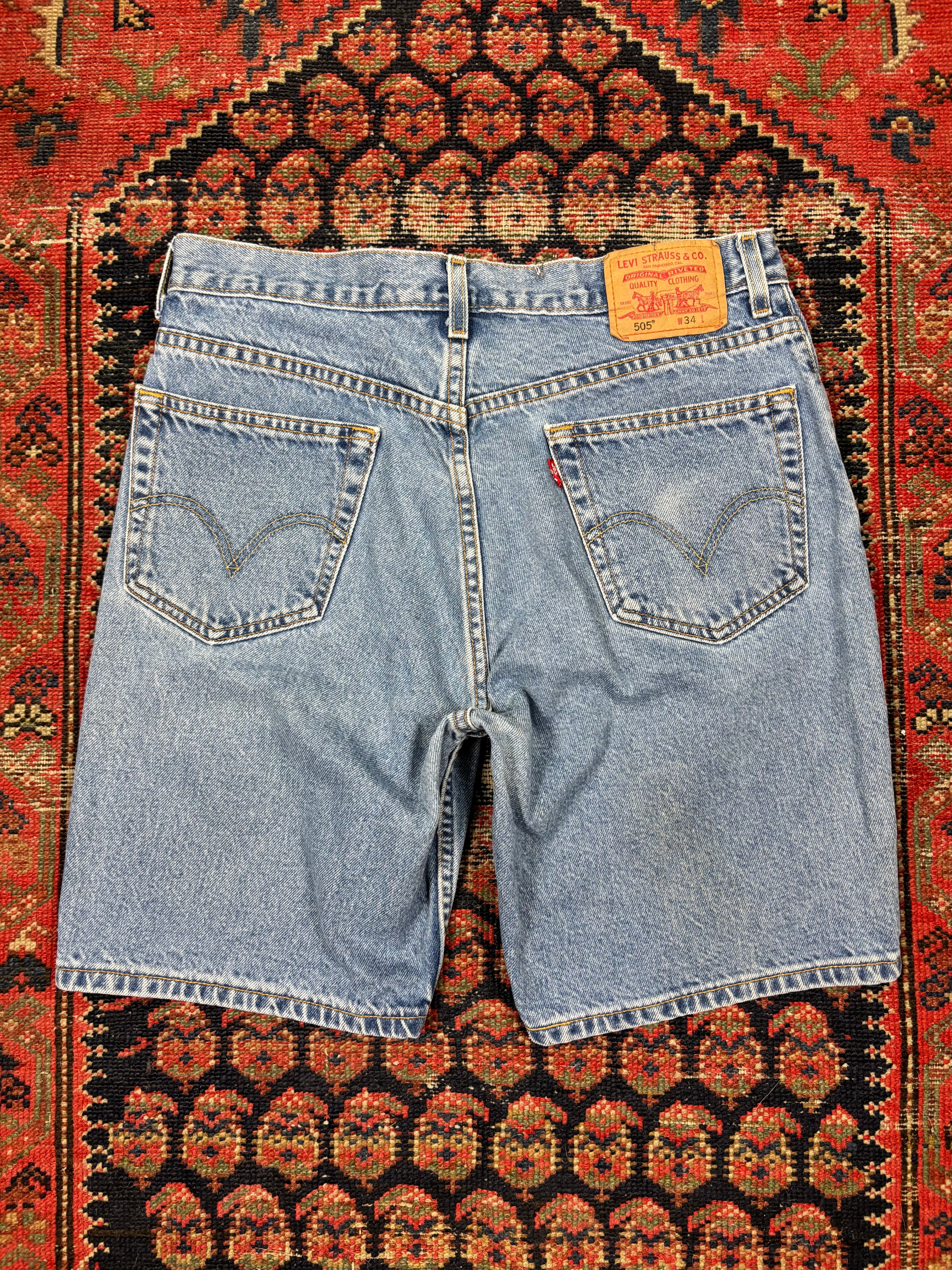 VINTAGE LEVIS 505 BLUE JORTS W/34