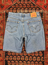 Load image into Gallery viewer, VINTAGE LEVIS 505 BLUE JORTS W/34