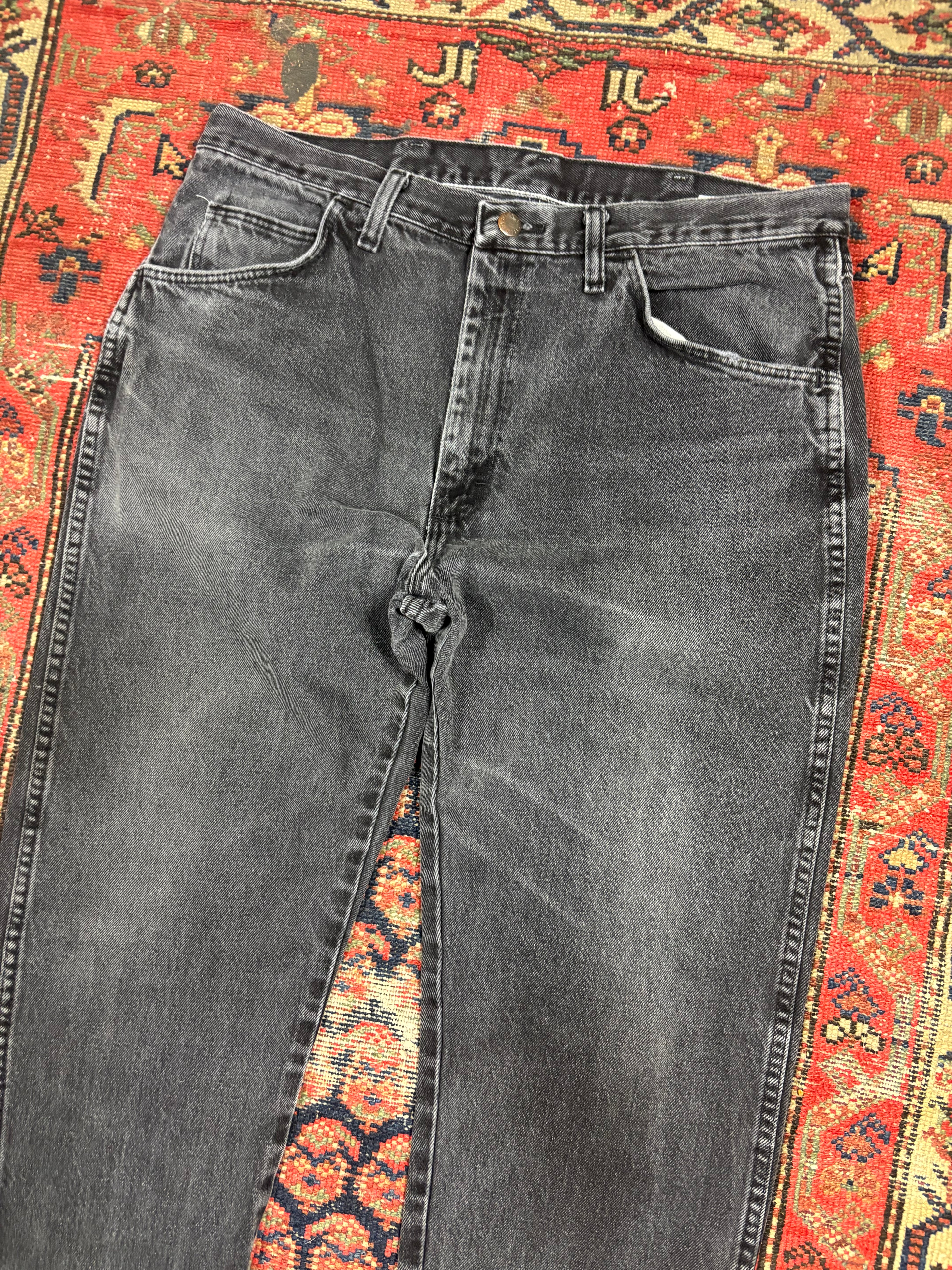 VINTAGE FADED BLACK RUSTLER DENIM W/36
