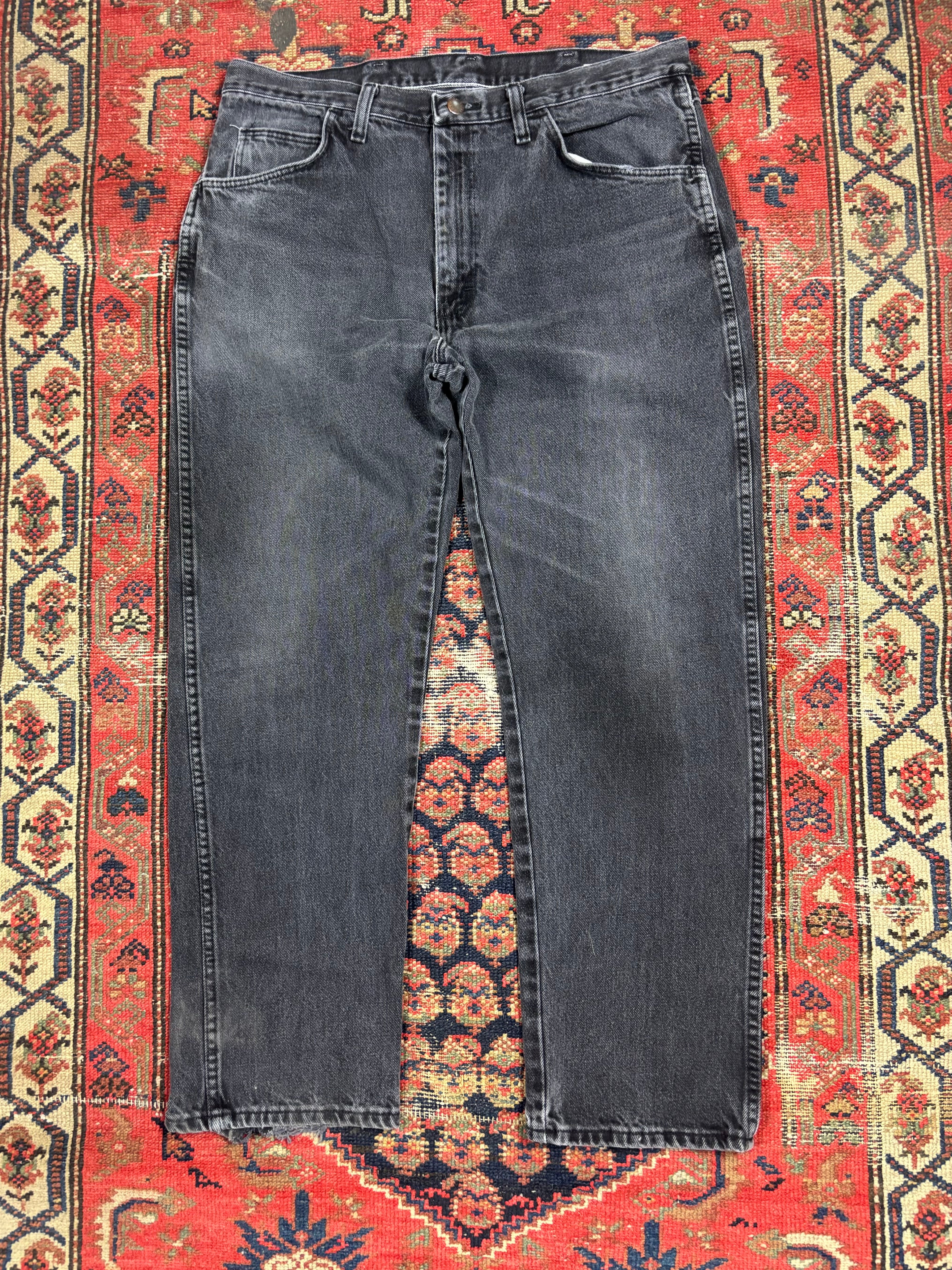 VINTAGE FADED BLACK RUSTLER DENIM W/36