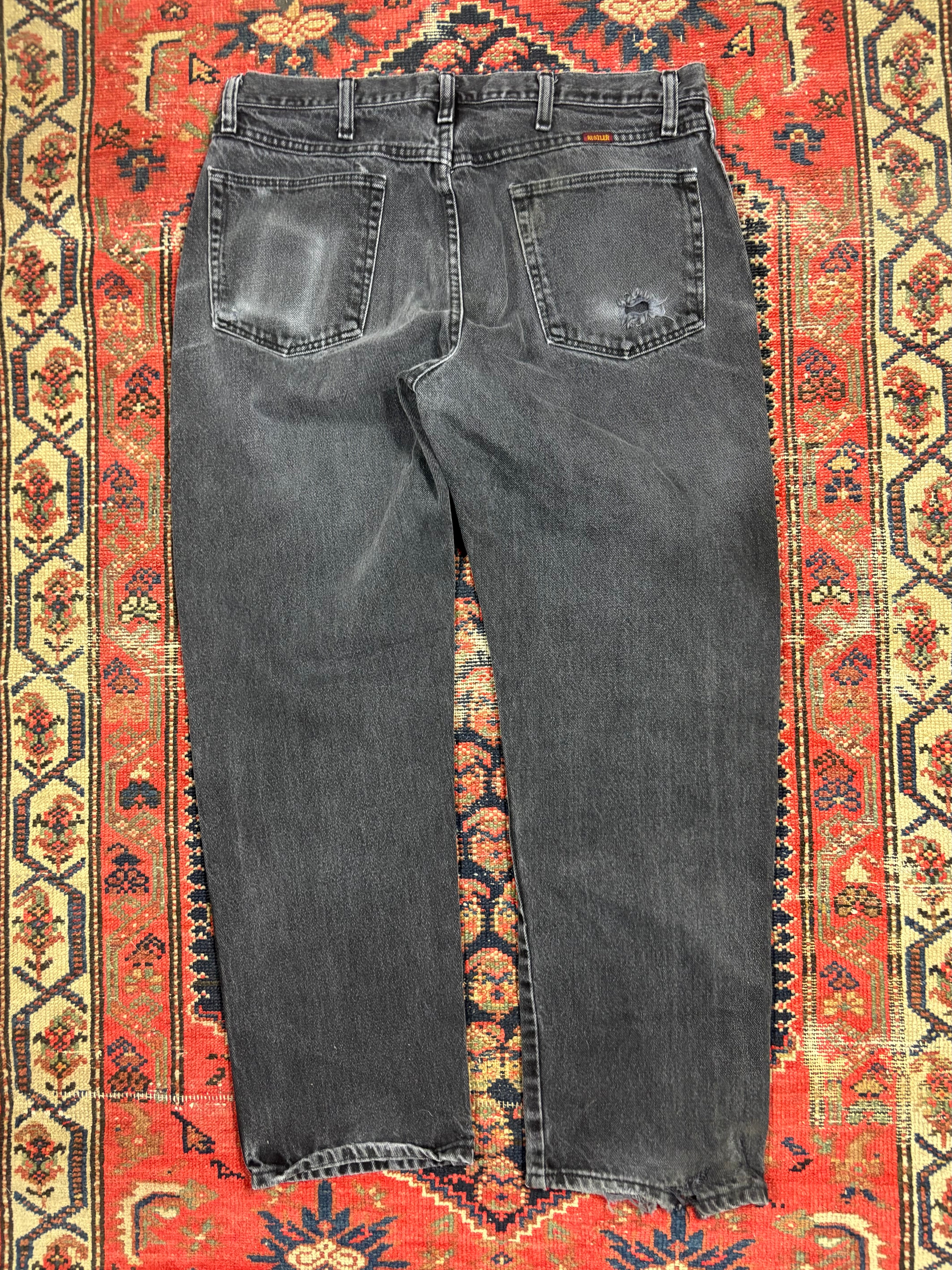 VINTAGE FADED BLACK RUSTLER DENIM W/36