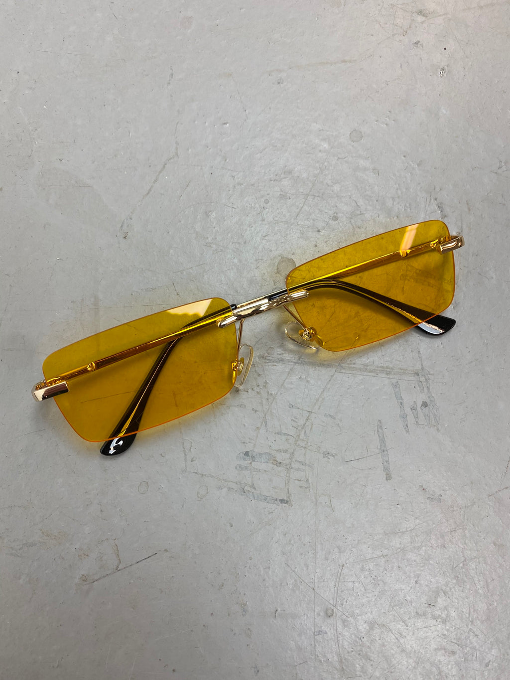 Yellow / Gold metal framed sunglasses