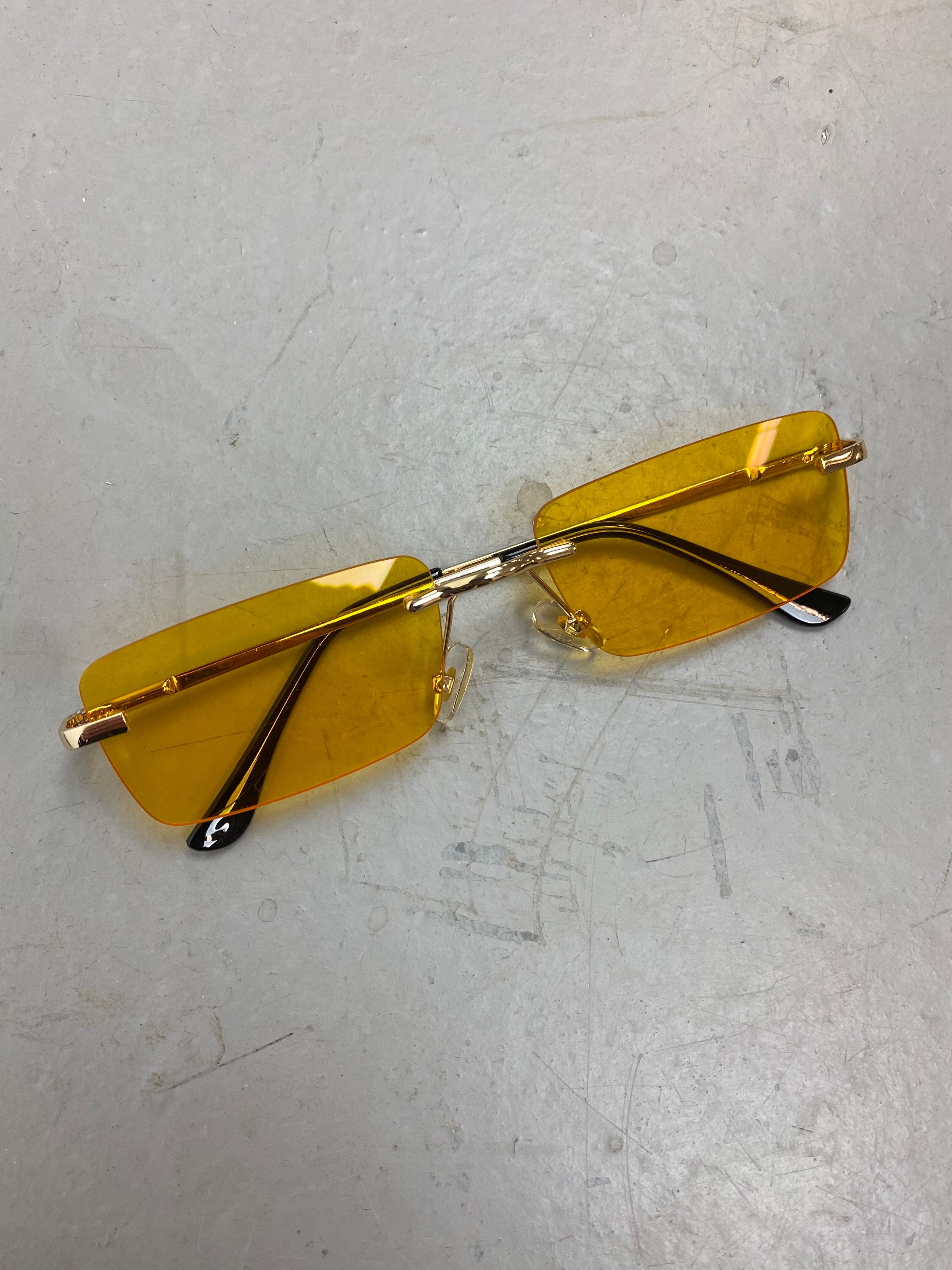Yellow / Gold metal framed sunglasses