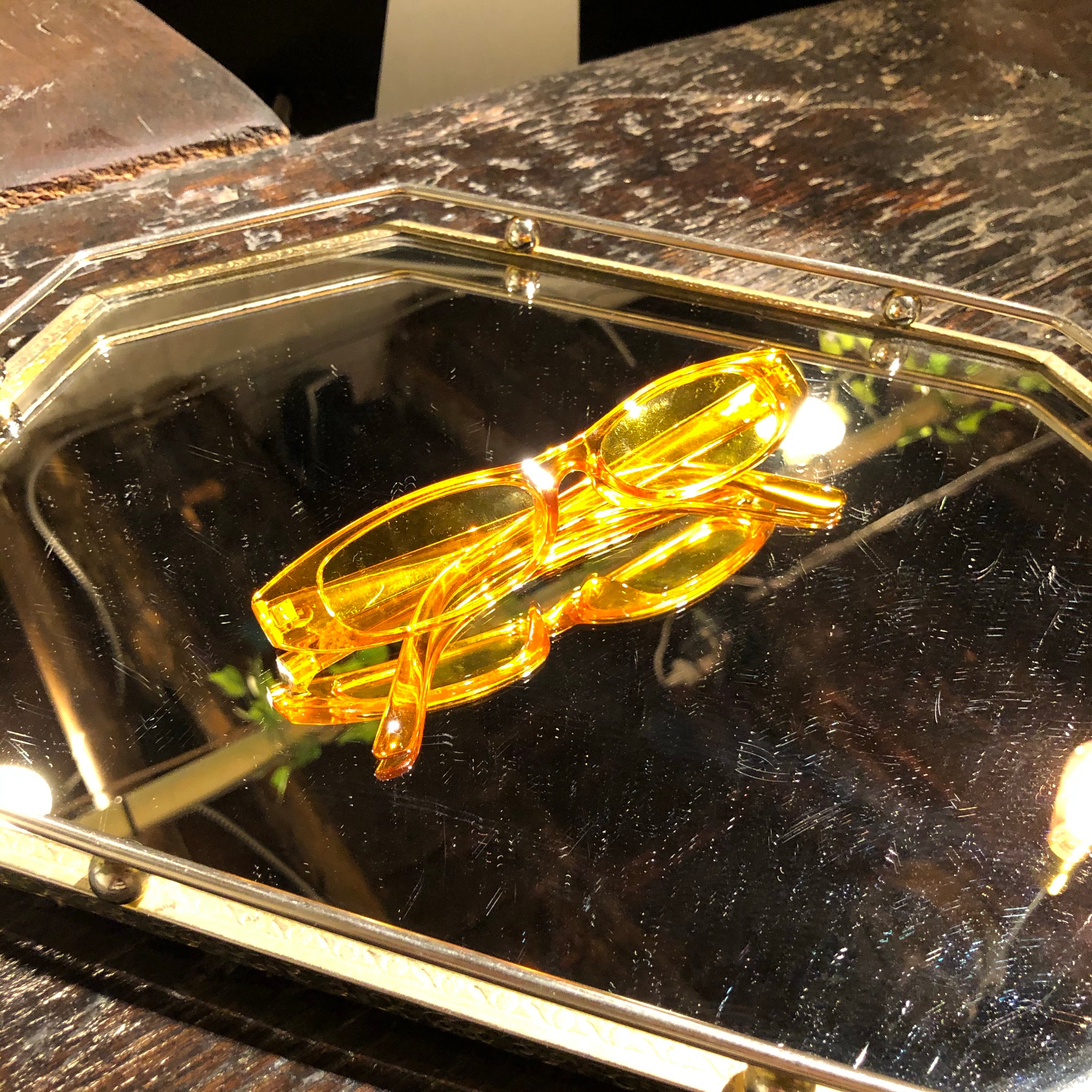 Electric orange sunglasses