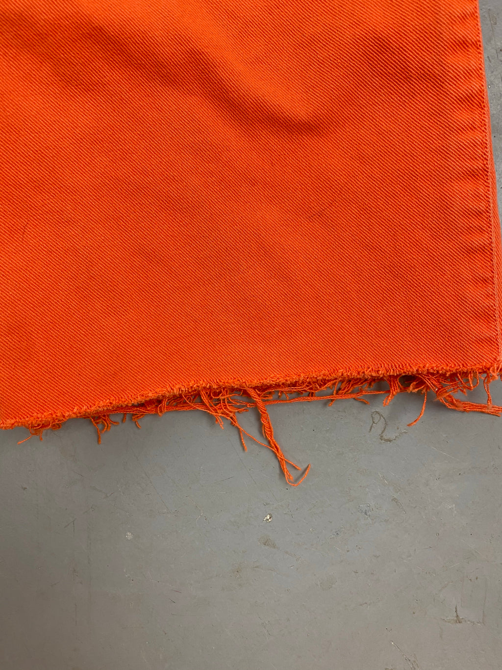 Orange high waisted frayed denim shorts
