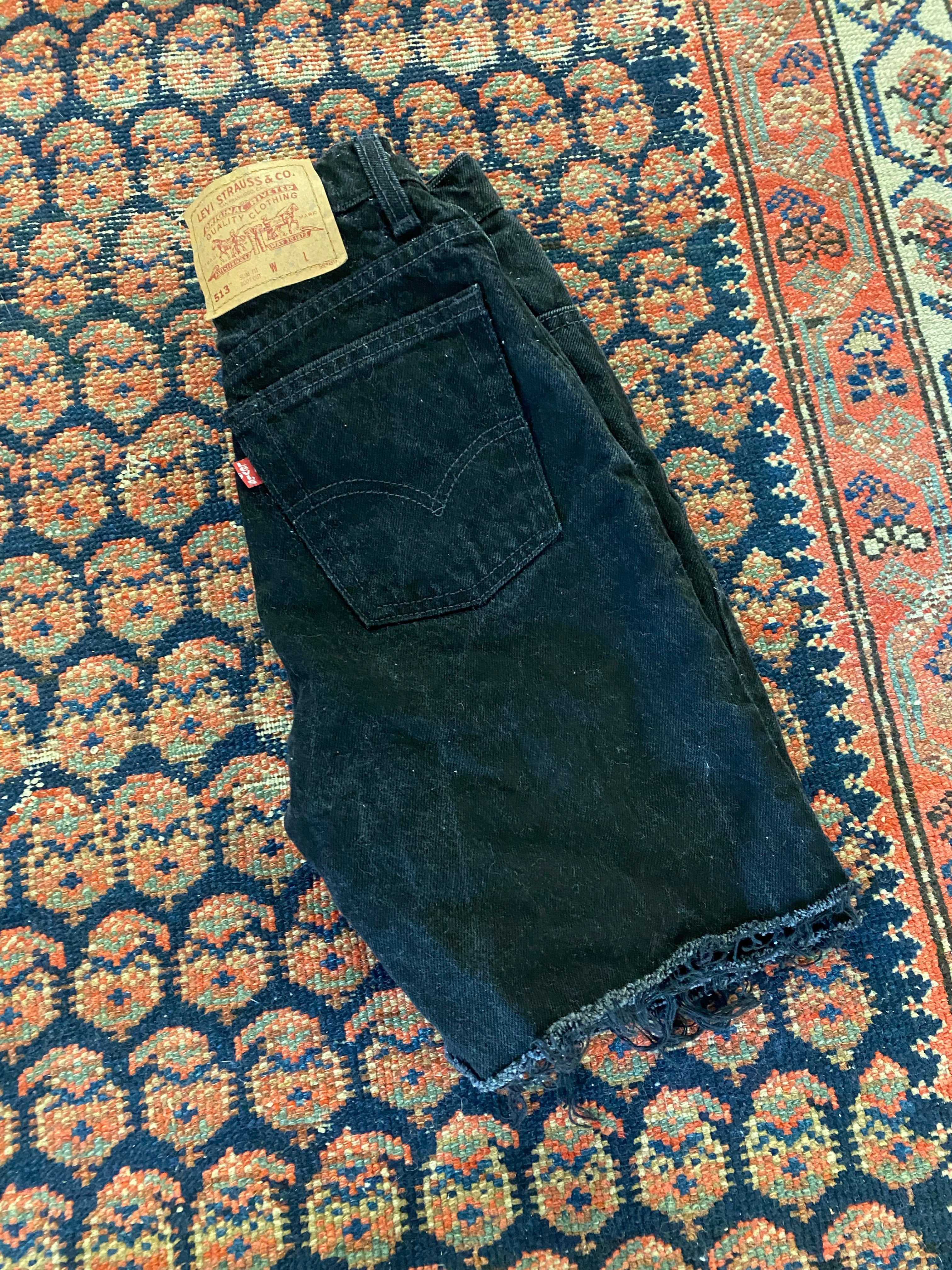 90s High Waisted Levis Frayed Denim Shorts - 24in