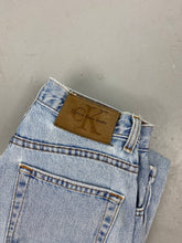 Load image into Gallery viewer, 90s light wash high waisted Calvin Klein jeans - 27 in