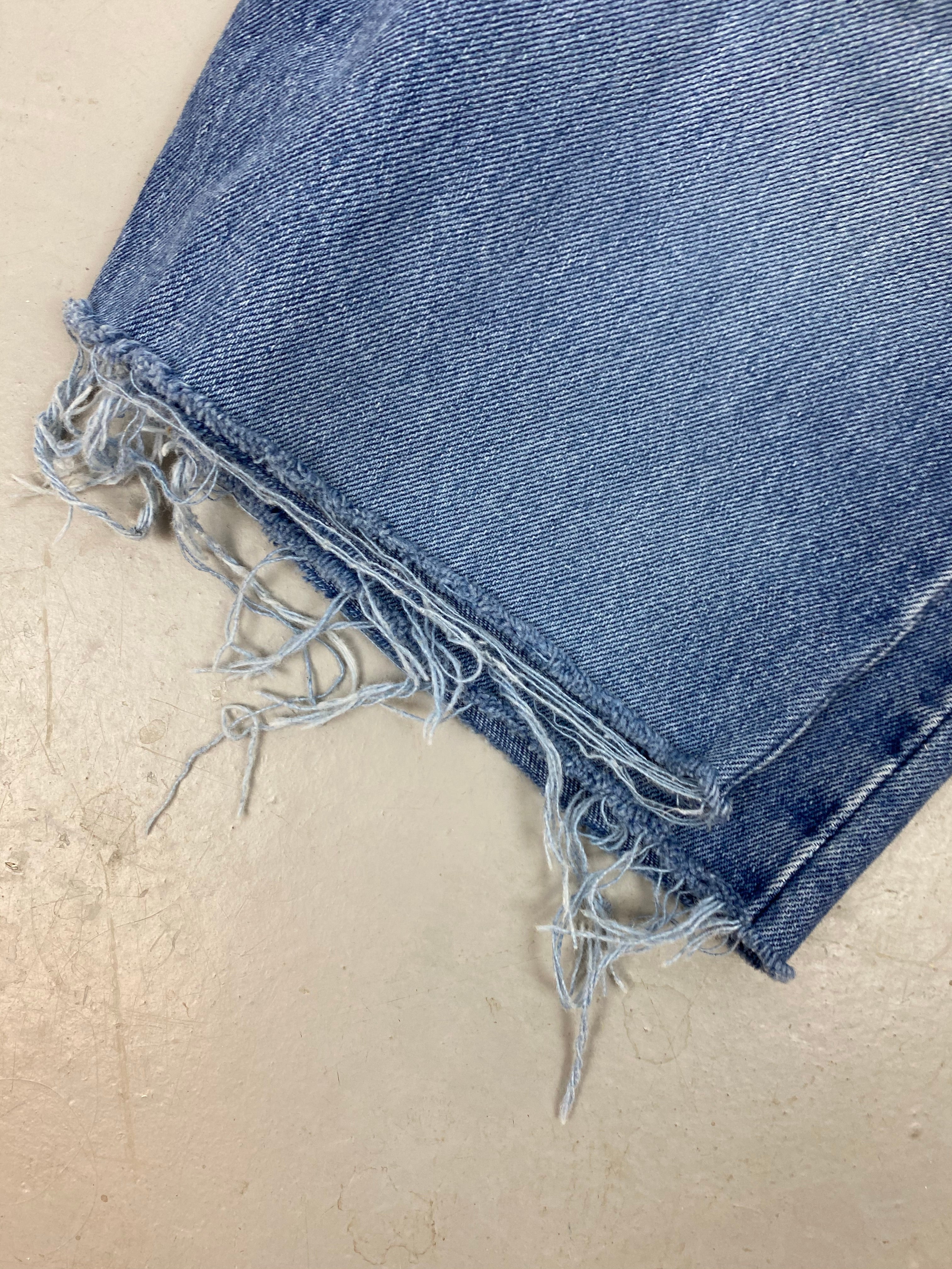 Vintage high waisted frayed denim Levi shorts - 24in