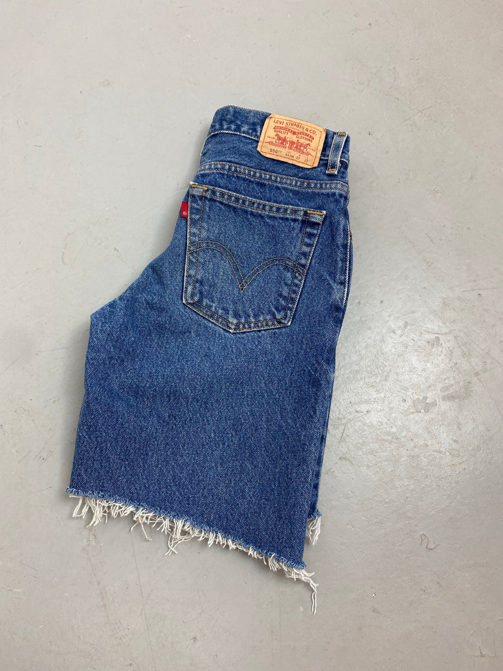 90s frayed high waisted Levi’s denim