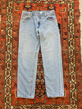 Load image into Gallery viewer, Vintage light wash Levi’s jeans - 32in/w
