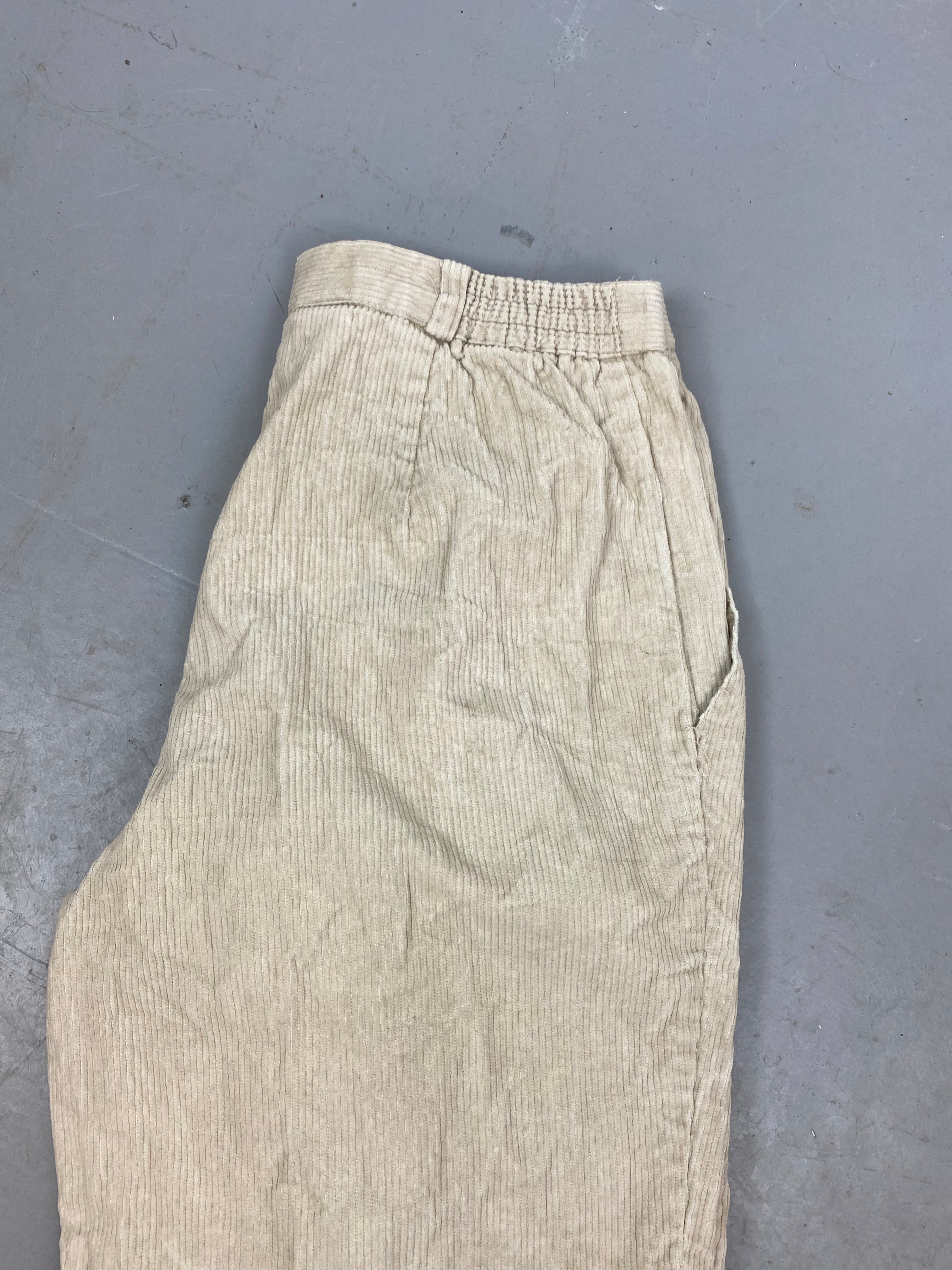 Baggy Creme corduroy trousers