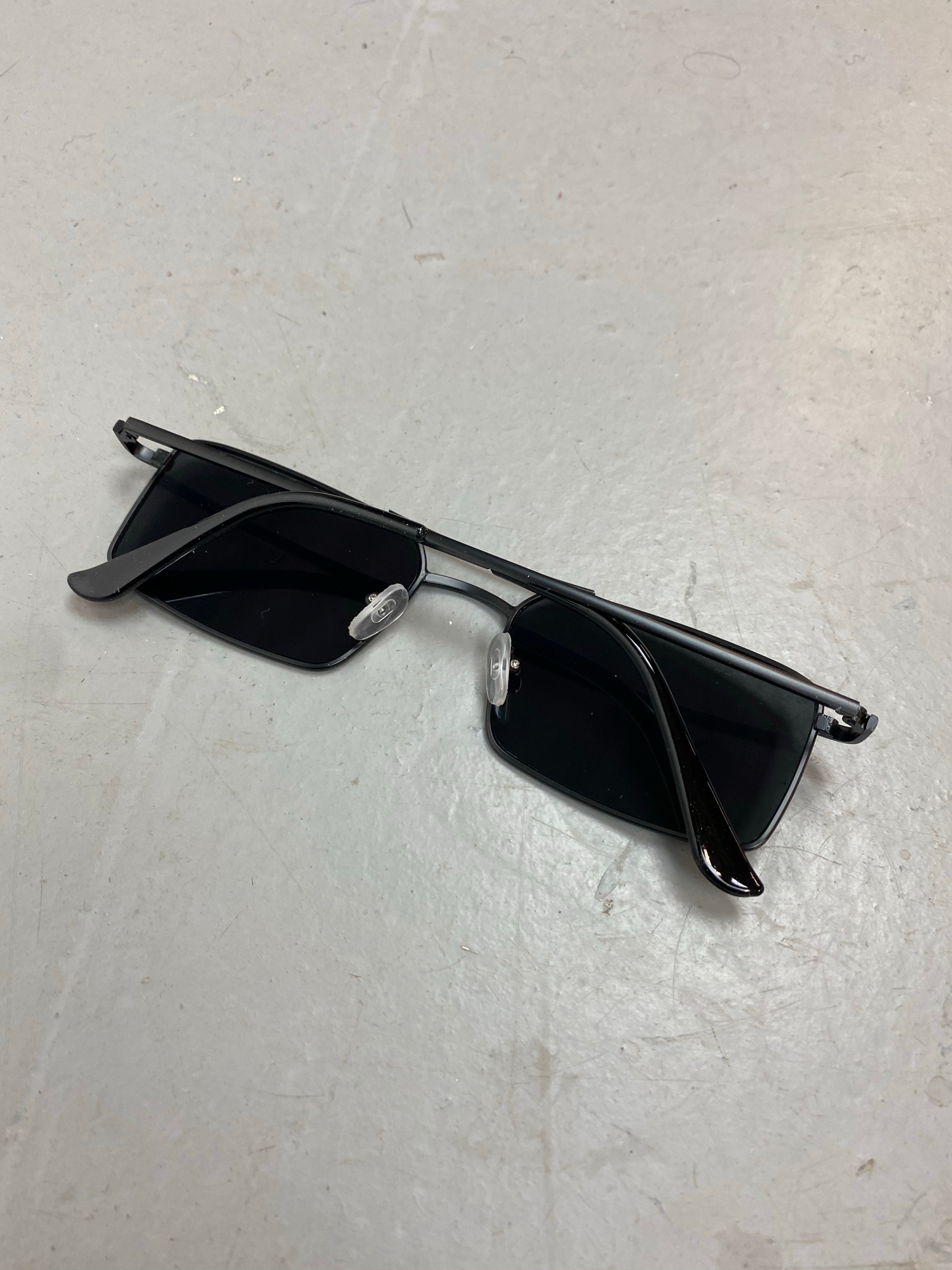 Black framed metal sunglasses
