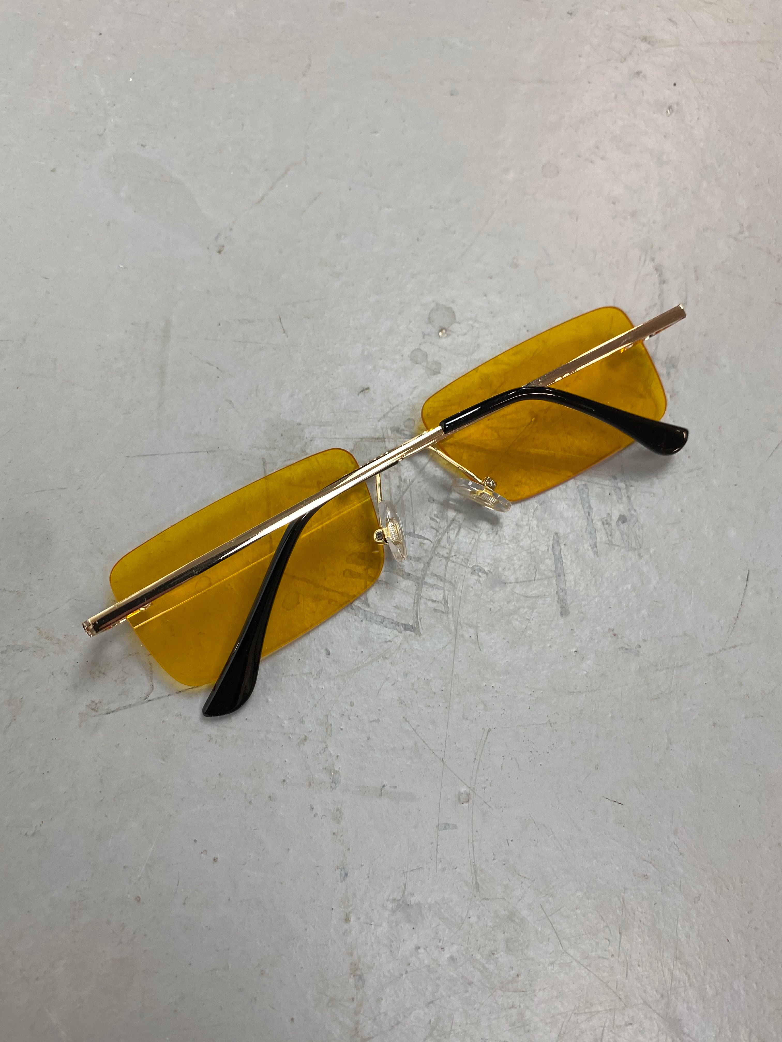 Yellow / Gold metal framed sunglasses