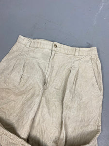 Baggy Creme corduroy trousers