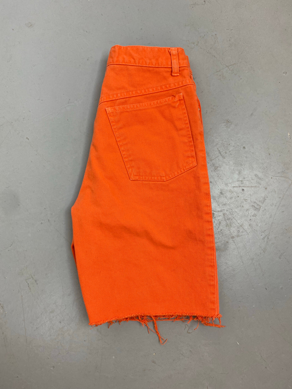Orange high waisted frayed denim shorts