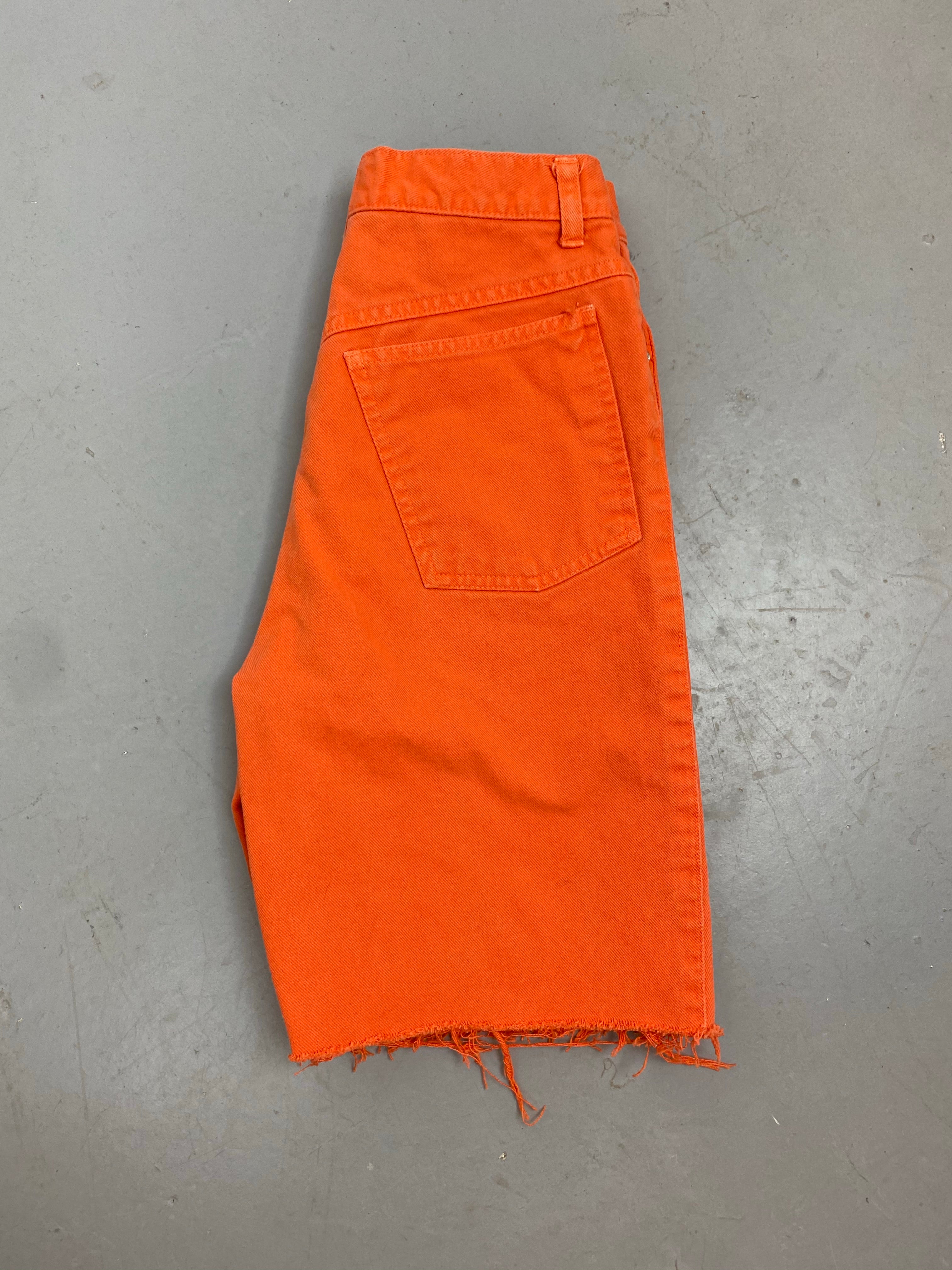 Orange high waisted frayed denim shorts