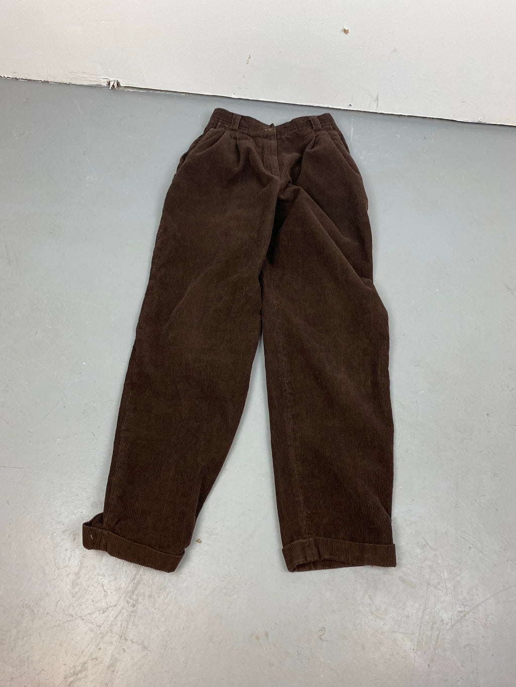 Chocolate brown pleated corduroy trousers