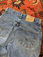 Load image into Gallery viewer, Vintage orange tab Levi’s - 28IN/W