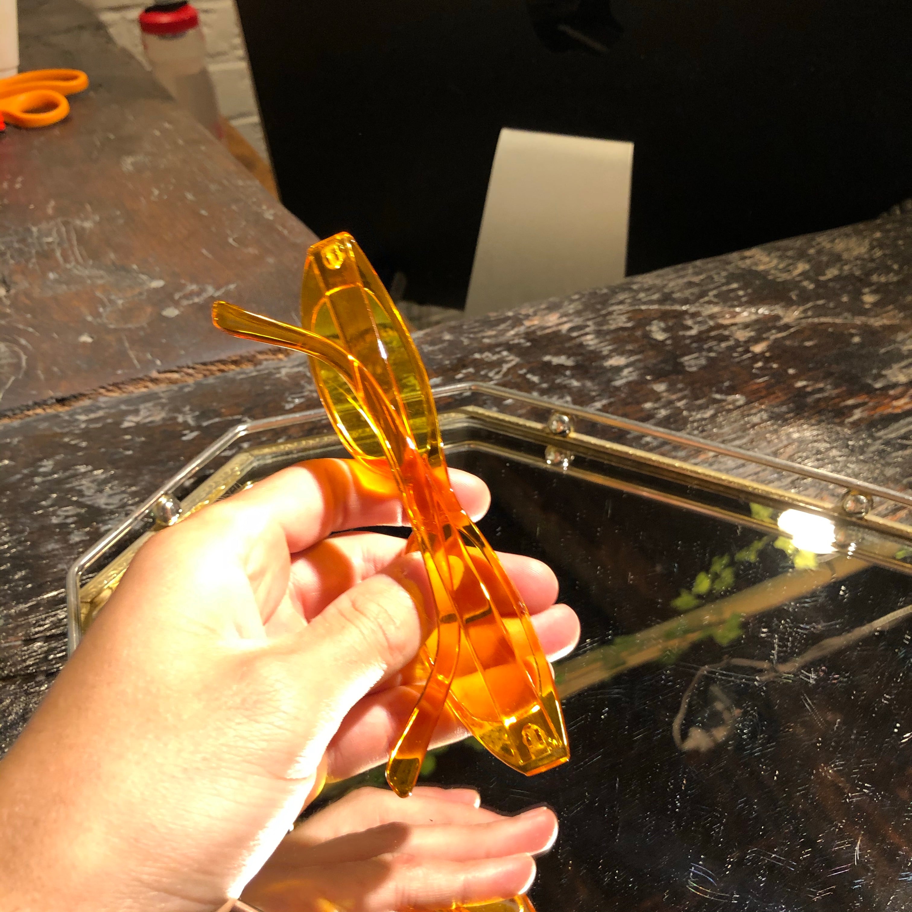 Electric orange sunglasses