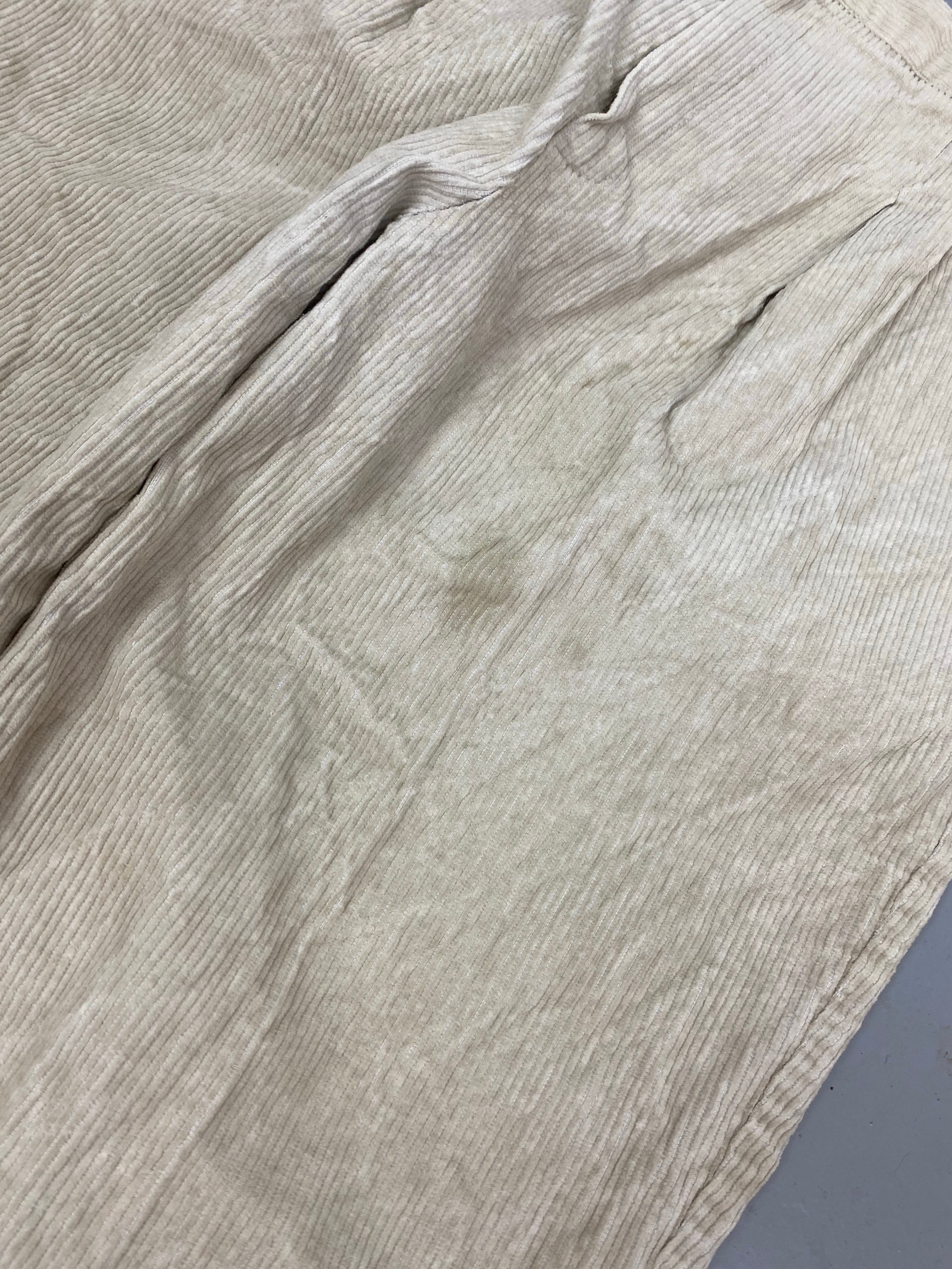 Baggy Creme corduroy trousers