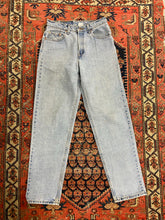 Load image into Gallery viewer, Vintage High Waisted Light Wash Levi’s - 28inches