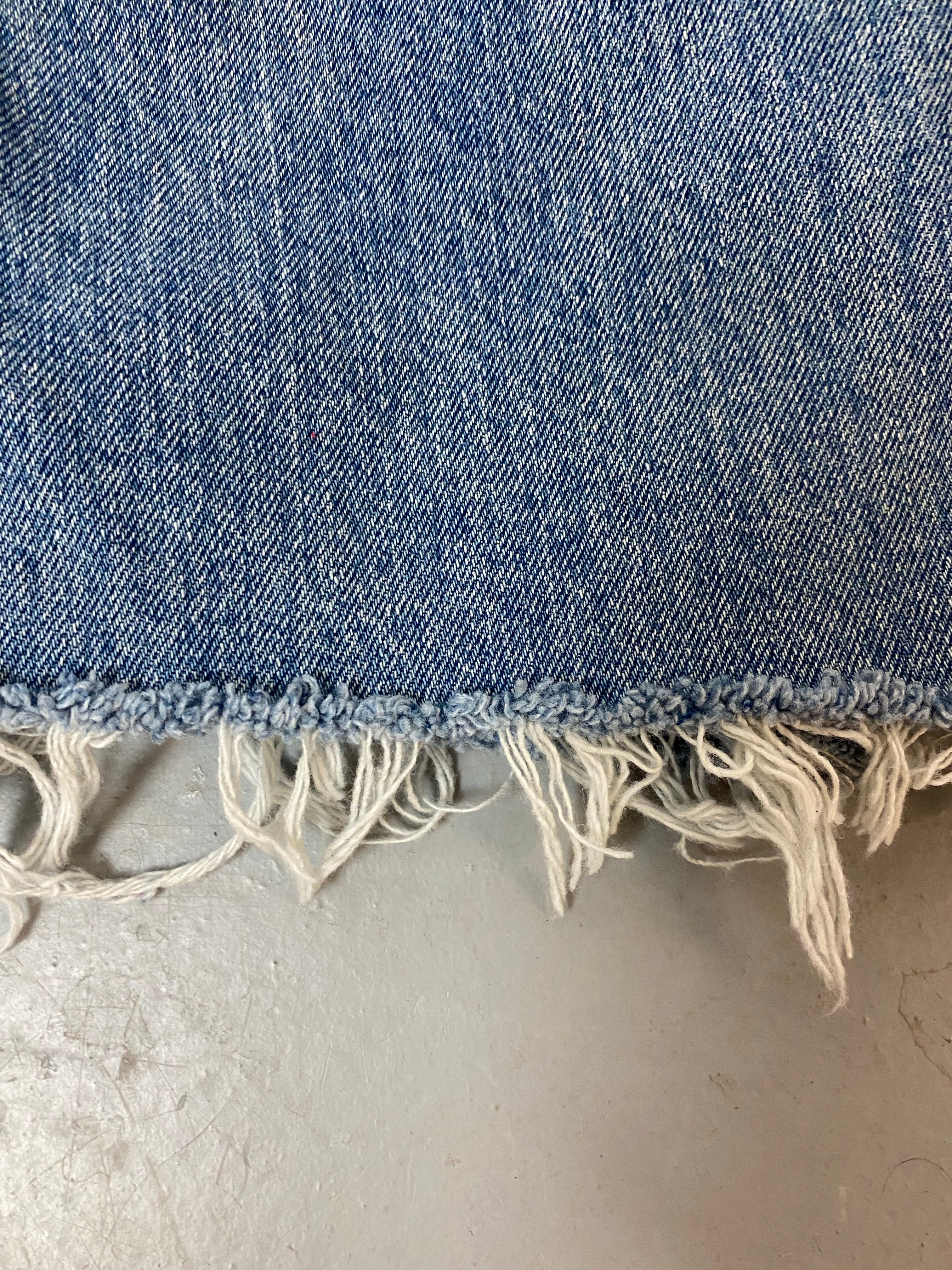 Vintage High Waisted Levi’s Frayed Denim Shorts - 30in