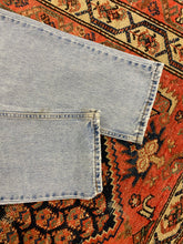 Load image into Gallery viewer, Vintage High Waisted Light Wash Levi’s - 28inches