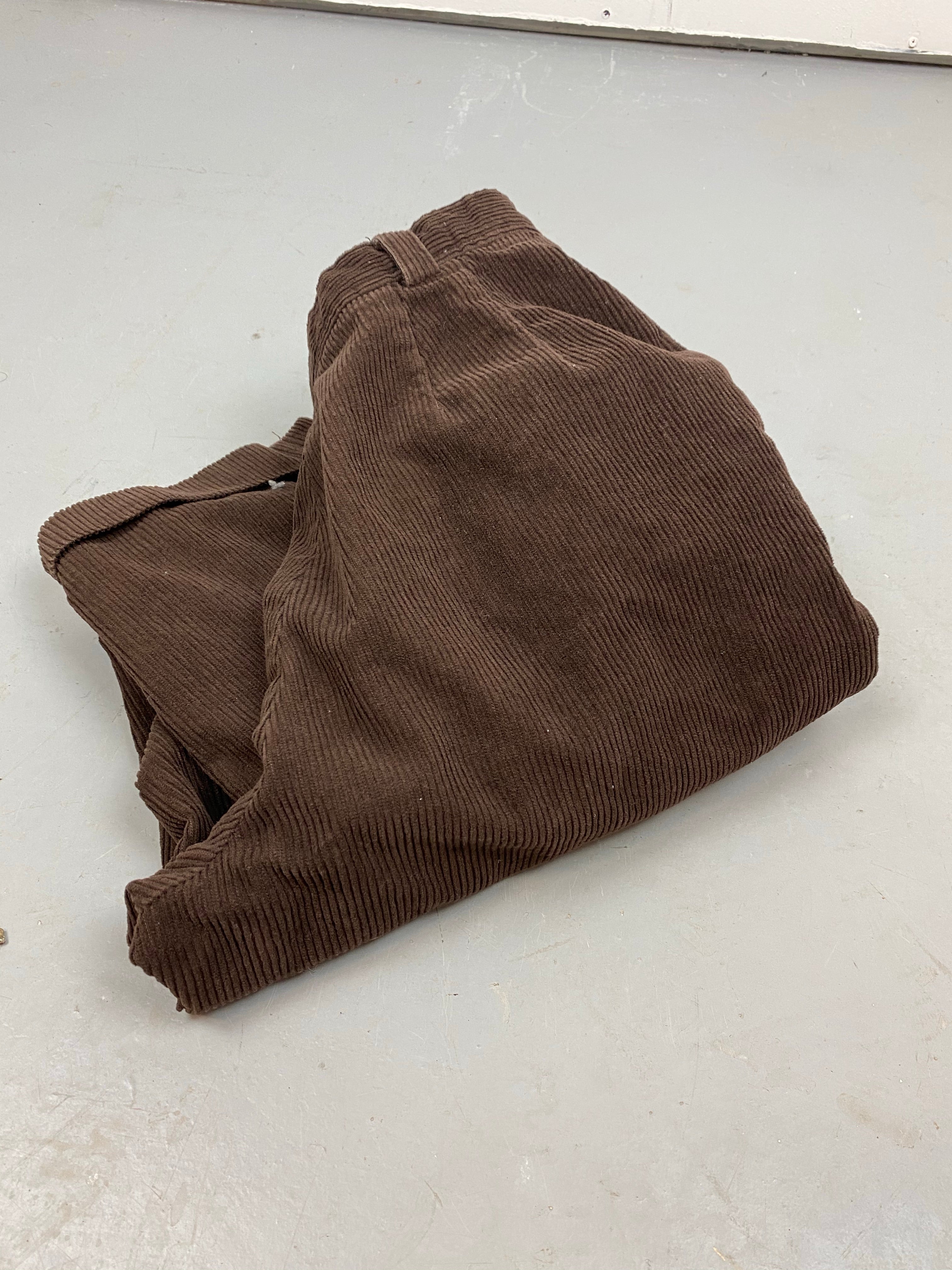 Chocolate brown pleated corduroy trousers
