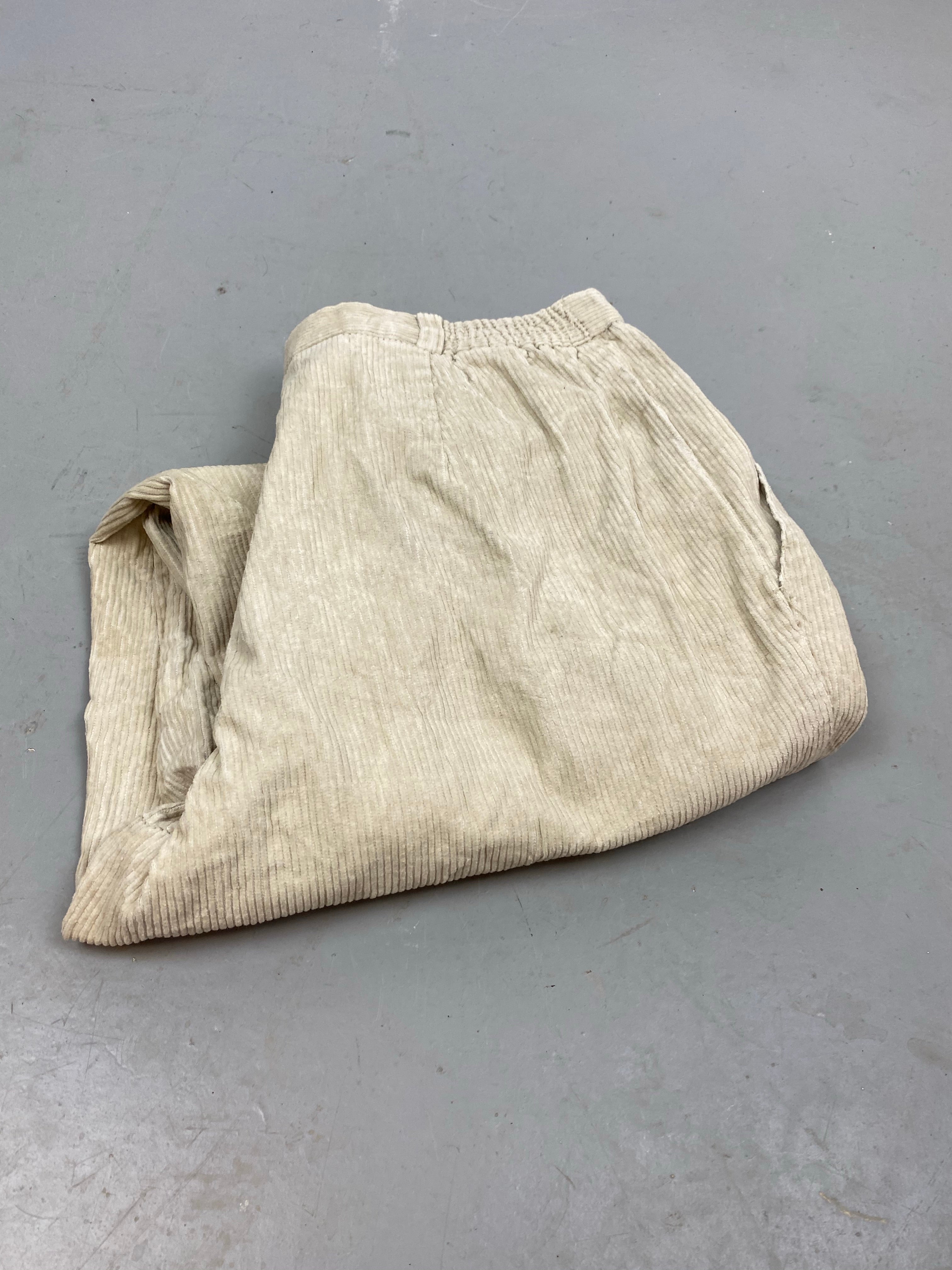 Baggy Creme corduroy trousers