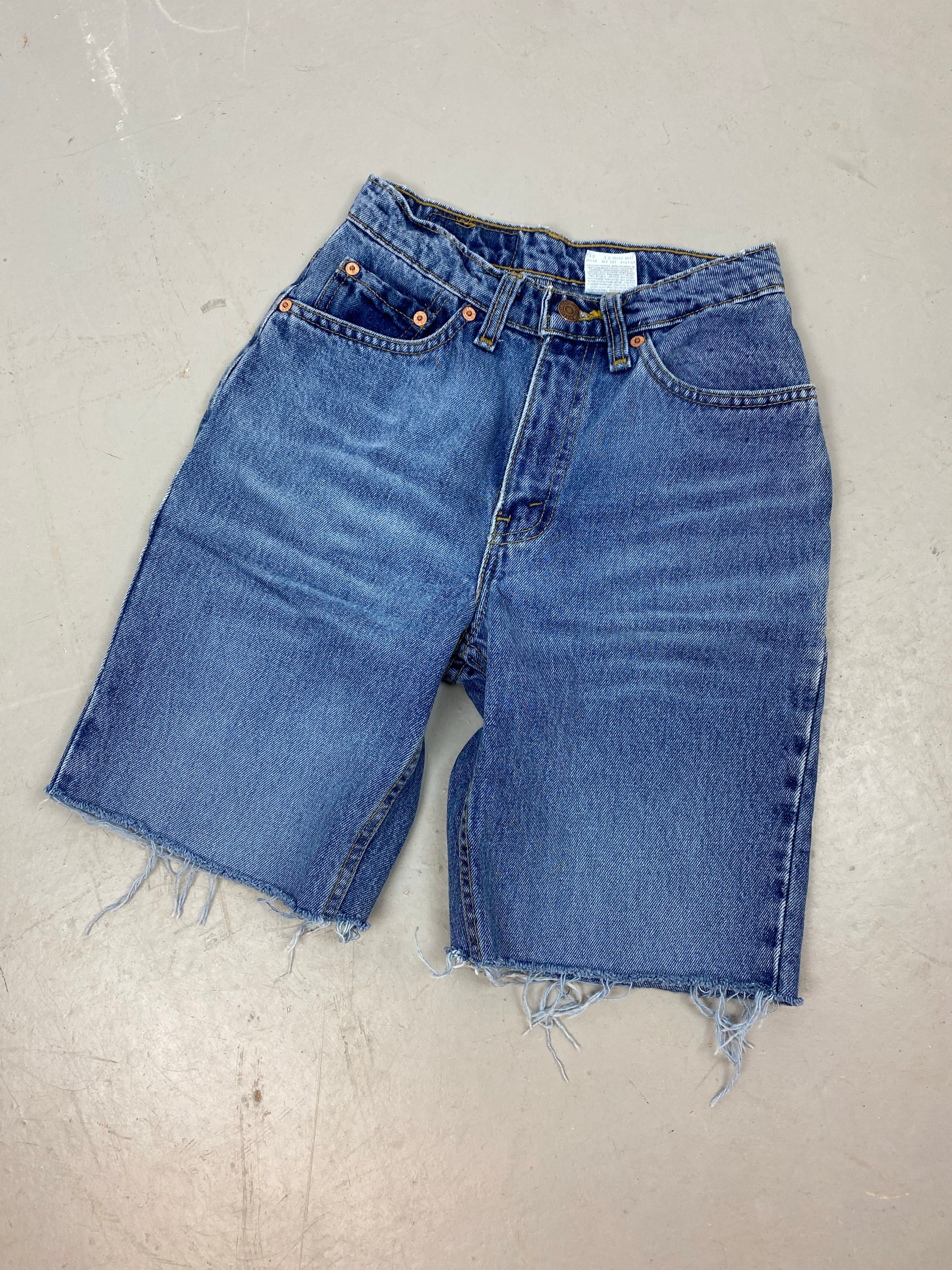 Vintage high waisted frayed denim Levi shorts - 24in