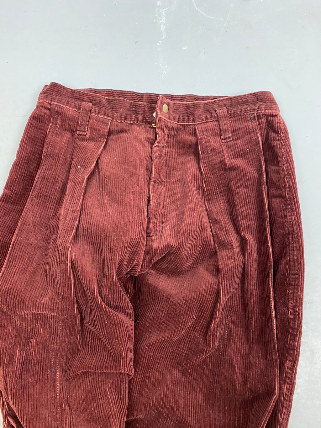 Burgundy corduroy wide pleated trousers