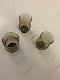 Set of three tinted small glasses