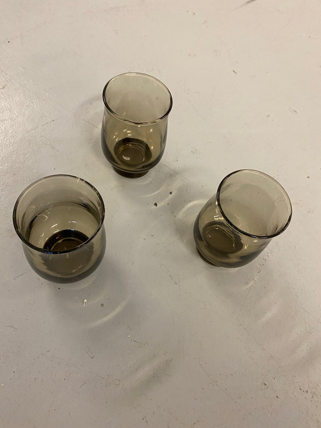 Set of three tinted small glasses