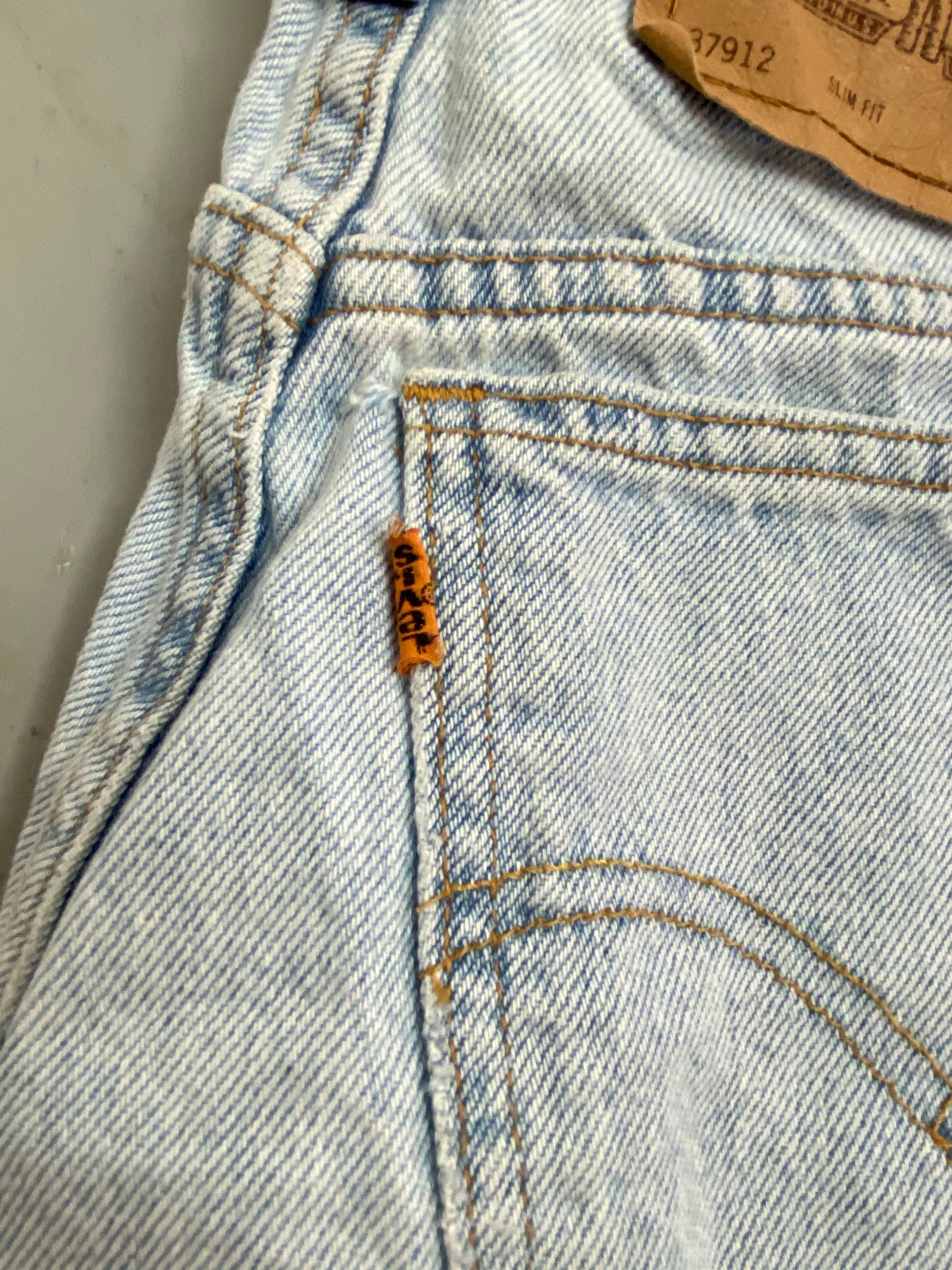 90s orange tab Levi’s denim high waisted shorts