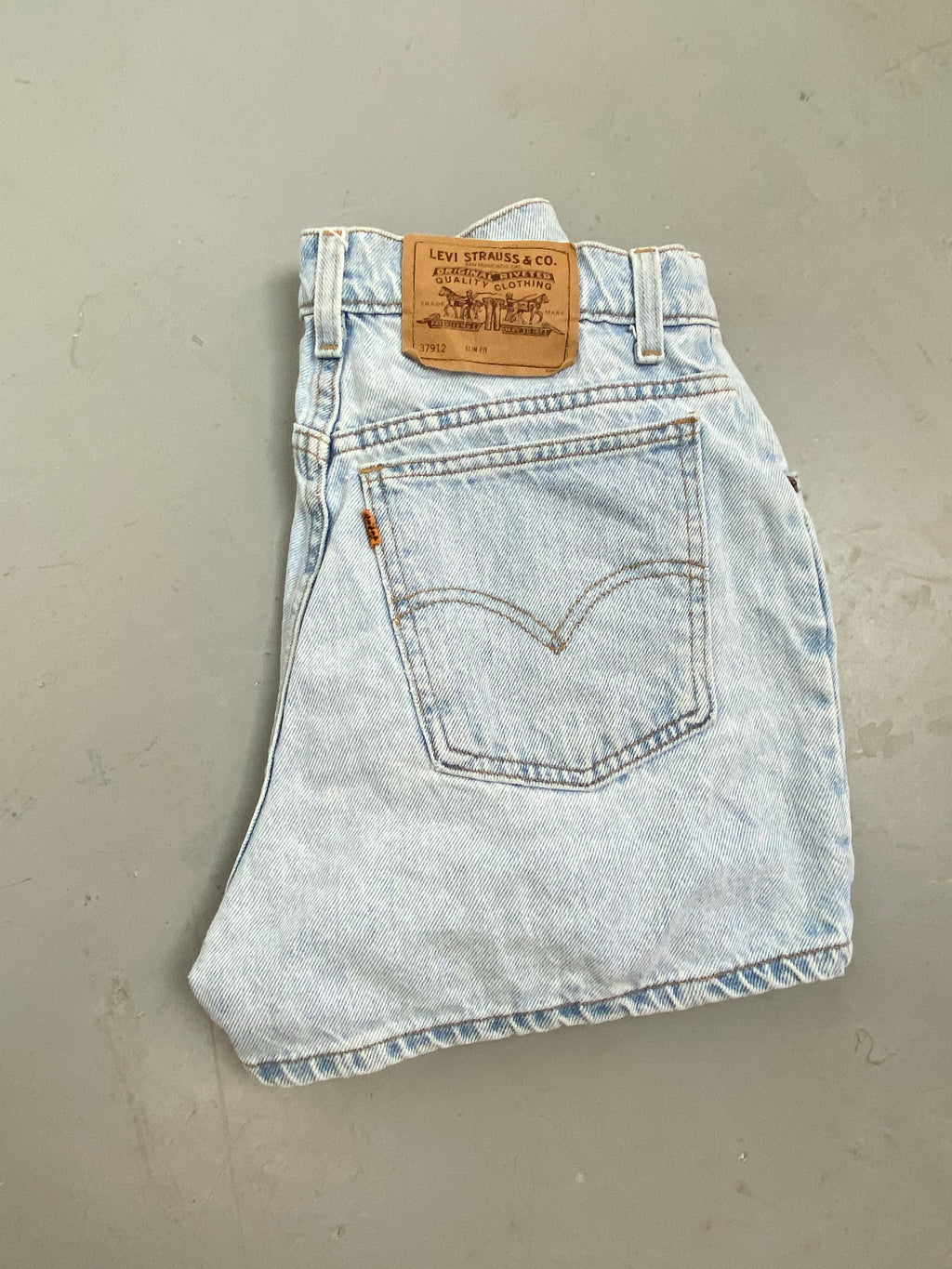 90s orange tab Levi’s denim high waisted shorts