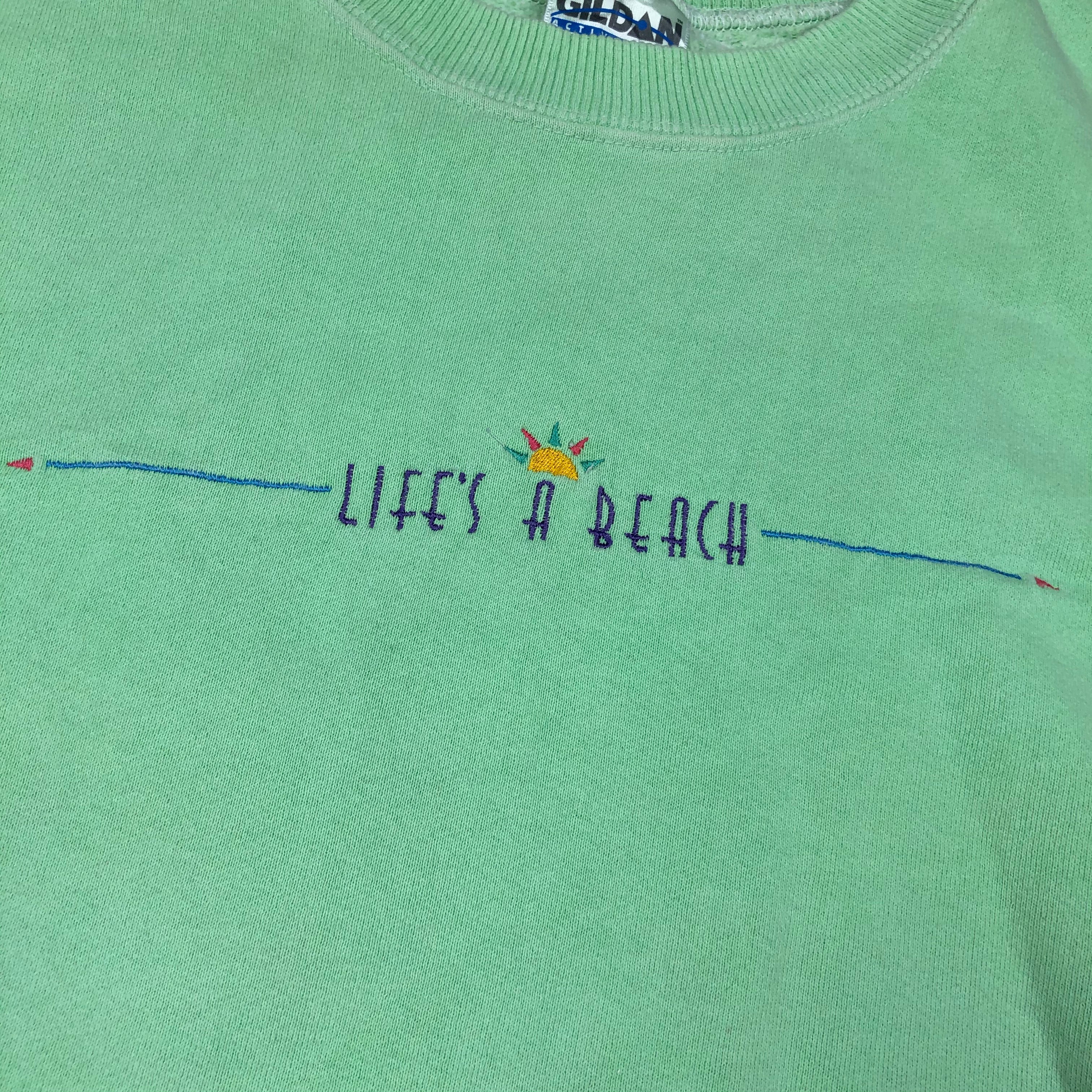 Embroidered life a beach Crewneck