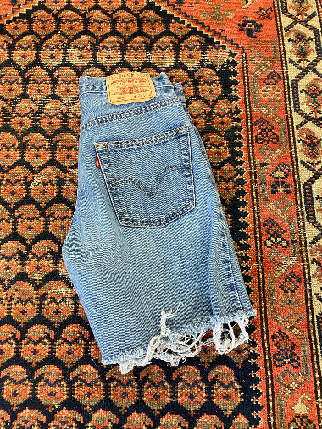 90s High Waisted Levis Frayed Denim shorts - 28in