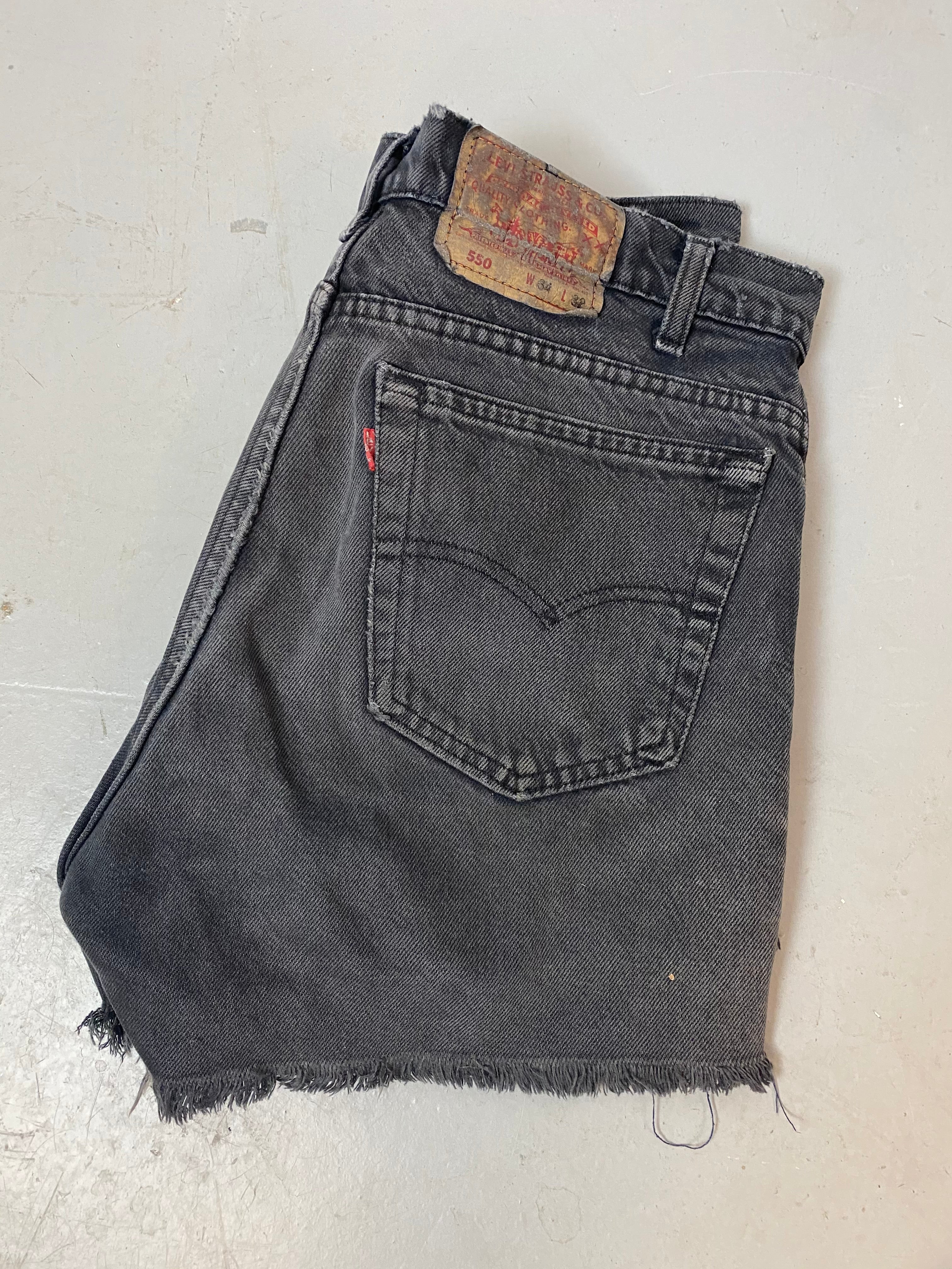 Vintage High Waisted Levi’s Frayed Denim Shorts - 34in